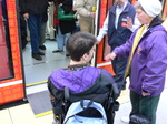 Seattle streetcar - wheelchair passenger is getting on.